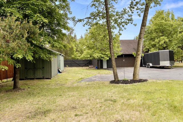 29774 Whispering Pines Rd, Lone Rock, WI 53556 - view of yard featuring an outdoor structure and driveway
