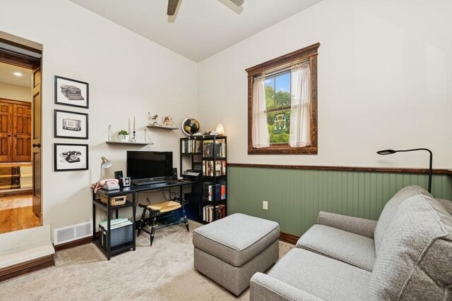 W522 Highland Rd, Genoa City, WI 53128 - carpeted home office with a wainscoted wall and a ceiling fan