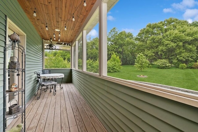 W522 Highland Rd, Genoa City, WI 53128 - wooden deck with a lawn and view of wooded area