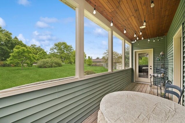 W522 Highland Rd, Genoa City, WI 53128 - sunroom featuring rail lighting