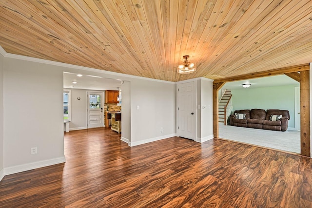 24324 W Overson Rd, Union Grove, WI 53182 - unfurnished living room with crown molding, wood ceiling, a chandelier, dark wood-style floors, and stairs