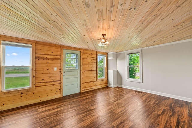 24324 W Overson Rd, Union Grove, WI 53182 - unfurnished room with wood finished floors, wood ceiling, baseboards, a chandelier, and crown molding