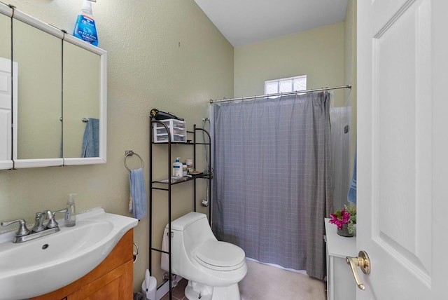 518-520 E Glover Ave, Milwaukee, WI 53212 - bathroom featuring vanity, toilet, a textured wall, and shower / bath combo with shower curtain