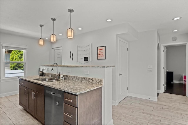 915 E Ohio Ave, Milwaukee, WI 53207 - kitchen featuring dishwasher, a sink, recessed lighting, dark brown cabinetry, and baseboards