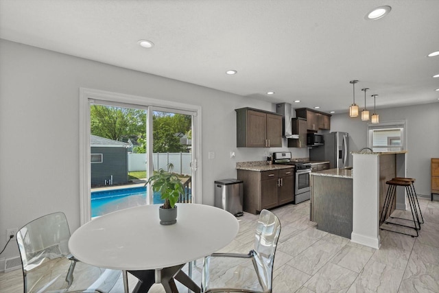 915 E Ohio Ave, Milwaukee, WI 53207 - dining space featuring recessed lighting, baseboards, and light marble finish floors