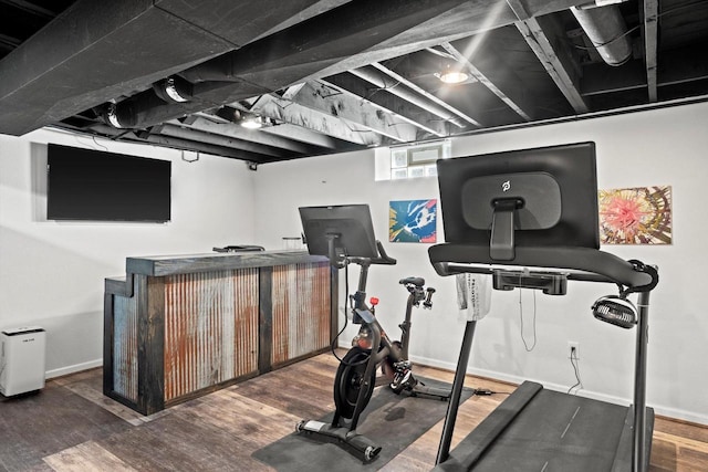 915 E Ohio Ave, Milwaukee, WI 53207 - exercise room featuring wood finished floors, baseboards, and bar