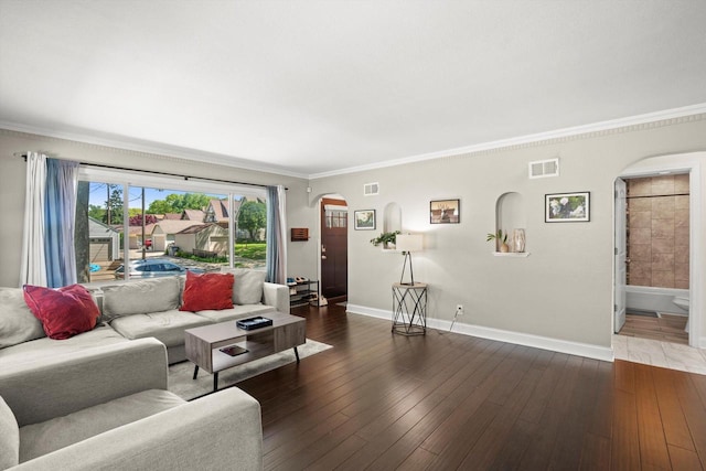 915 E Ohio Ave, Milwaukee, WI 53207 - living room with arched walkways, hardwood / wood-style floors, crown molding, and baseboards