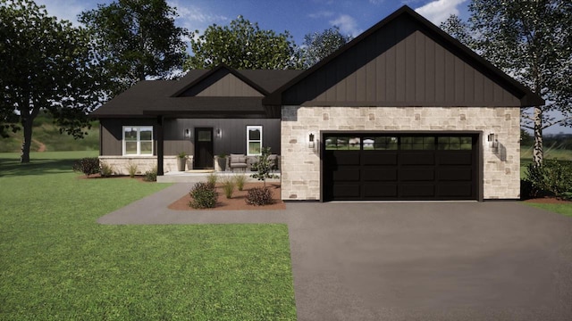 709 Prairie Ln, Mazomanie, WI 53560 - view of front of house with stone siding, asphalt driveway, an attached garage, a front lawn, and board and batten siding
