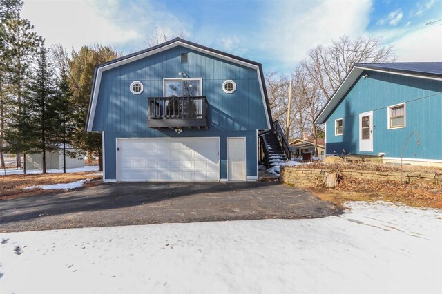N1416 W Stratton Rd, Waupaca, WI 54981 - garage featuring asphalt driveway
