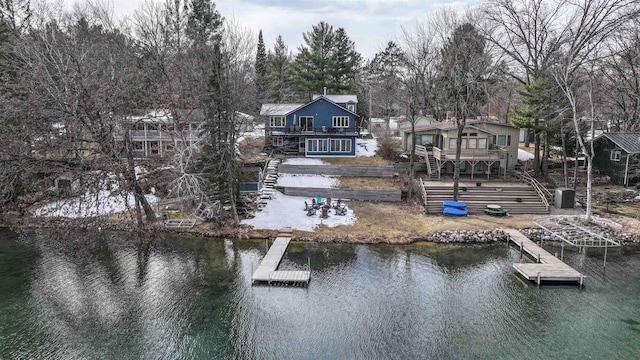 N1416 W Stratton Rd, Waupaca, WI 54981 - dock area featuring stairs and a deck with water view