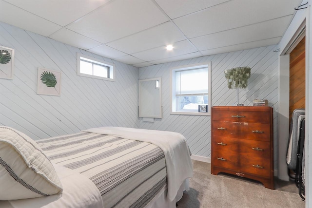 N1416 W Stratton Rd, Waupaca, WI 54981 - carpeted bedroom with wooden walls and a drop ceiling