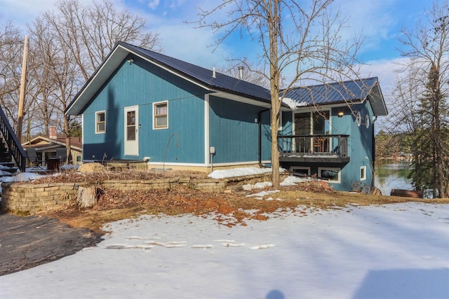 N1416 W Stratton Rd, Waupaca, WI 54981 - view of snow covered exterior with metal roof