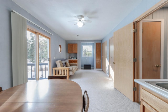 N1416 W Stratton Rd, Waupaca, WI 54981 - dining space featuring light carpet and ceiling fan