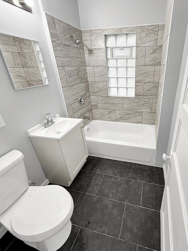 3381 N 26th St Unit 3383, Milwaukee, WI 53206 - full bathroom with toilet, vanity, shower / bathtub combination, and tile patterned flooring