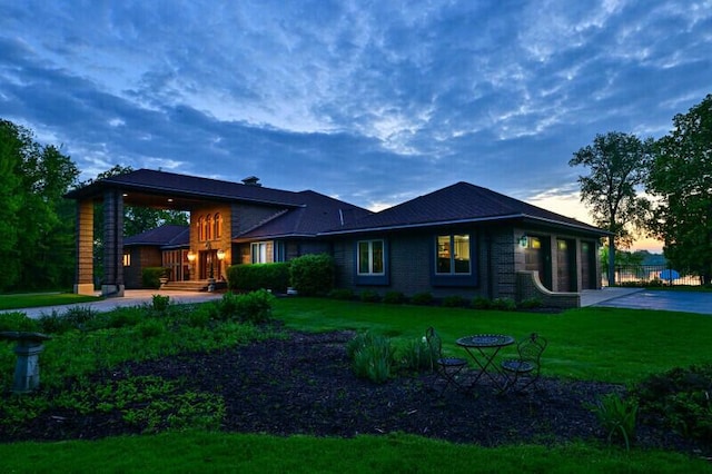S82W15980 Bass Bay Ln, Muskego, WI 53150 - rear view of property featuring a yard