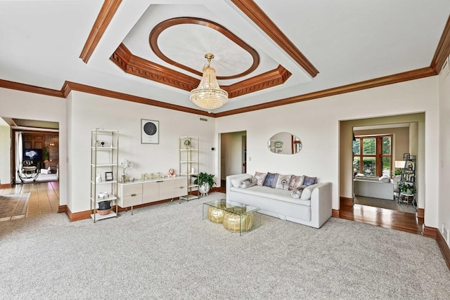 S82W15980 Bass Bay Ln, Muskego, WI 53150 - living area with carpet flooring, ornamental molding, a raised ceiling, a chandelier, and baseboards