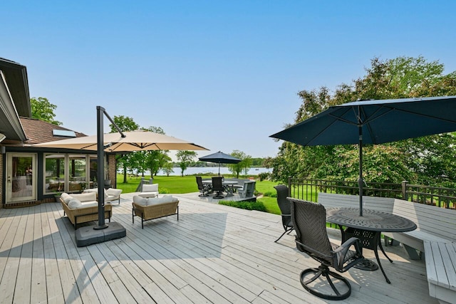S82W15980 Bass Bay Ln, Muskego, WI 53150 - wooden deck with outdoor dining space, an outdoor hangout area, and a lawn