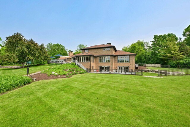 S82W15980 Bass Bay Ln, Muskego, WI 53150 - rear view of property featuring french doors and a chimney