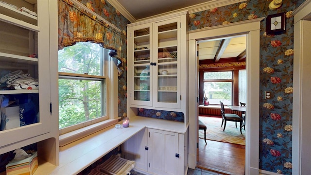 300 S Vine Ave, Marshfield, WI 54449 - home office with wallpapered walls and crown molding