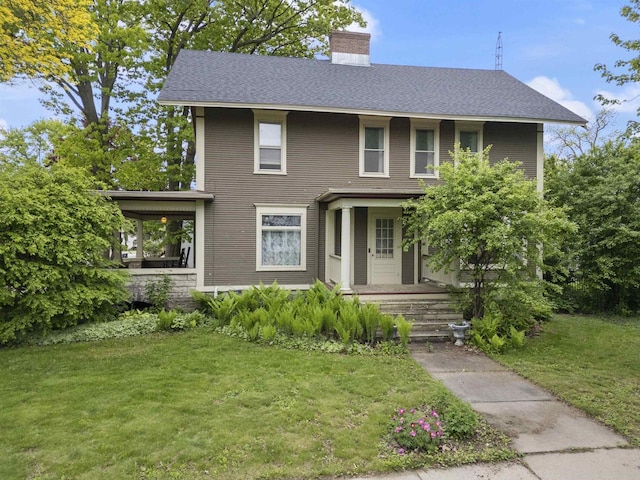 300 S Vine Ave, Marshfield, WI 54449 - view of front of home featuring a front yard, a chimney, a porch, and a shingled roof