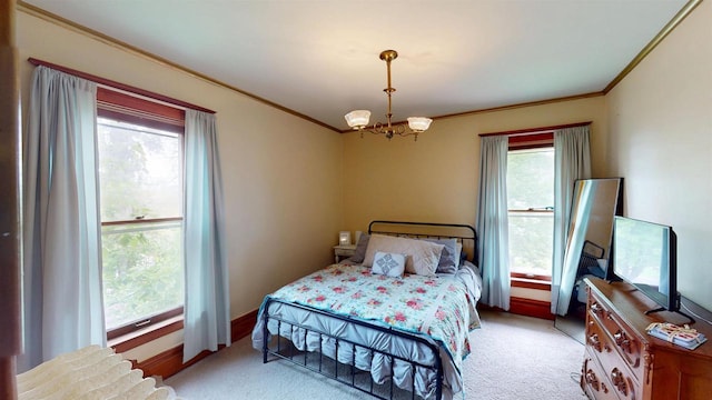 300 S Vine Ave, Marshfield, WI 54449 - bedroom with multiple windows, ornamental molding, light colored carpet, and a chandelier
