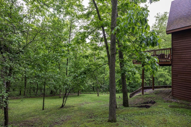 N1440 Red Oaks Dr, La Crosse, WI 54601 - view of grassy yard featuring a deck