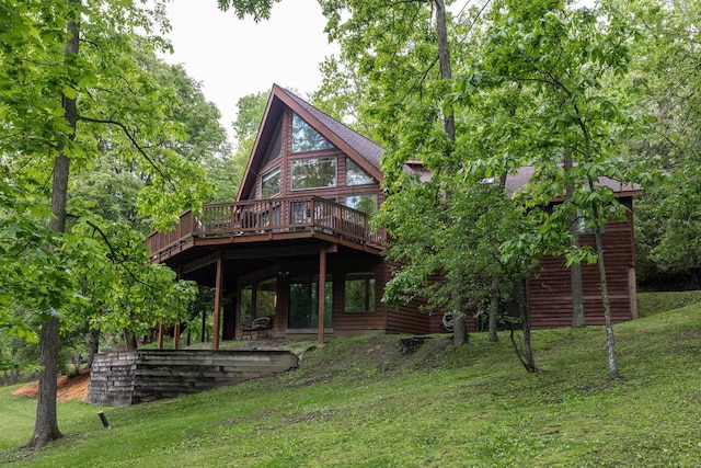 N1440 Red Oaks Dr, La Crosse, WI 54601 - rear view of property with a deck and a yard