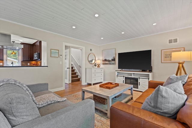 415 E Willow Rd, Fox Point, WI 53217 - living area featuring recessed lighting, light wood-type flooring, wooden ceiling, stairs, and baseboards