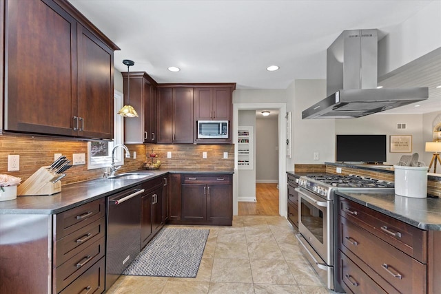 415 E Willow Rd, Fox Point, WI 53217 - kitchen with extractor fan, a sink, stainless steel appliances, backsplash, and recessed lighting