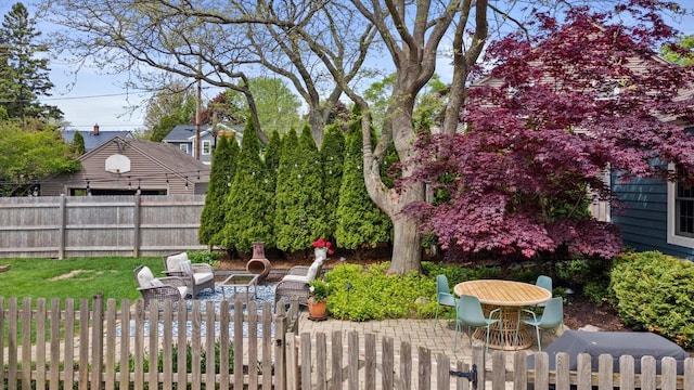 415 E Willow Rd, Fox Point, WI 53217 - fenced yard featuring a patio area