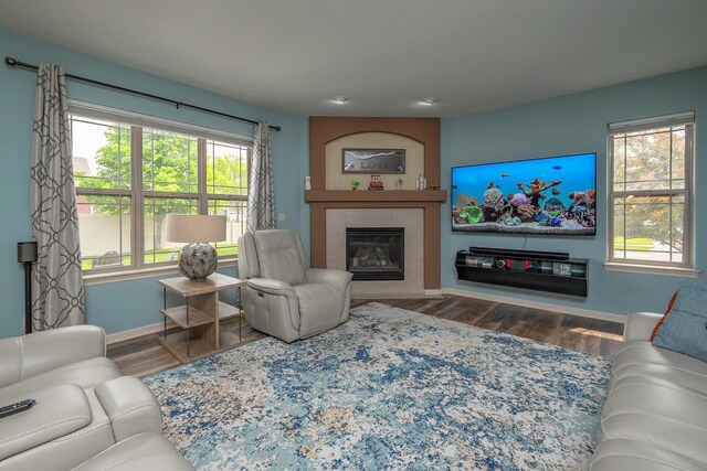 1712 Galena Dr, Port Washington, WI 53074 - living area with baseboards, wood finished floors, and a tile fireplace