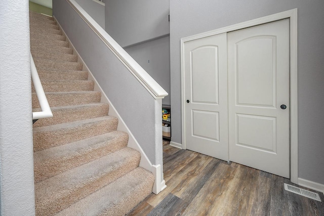 1712 Galena Dr, Port Washington, WI 53074 - stairs with wood finished floors and baseboards