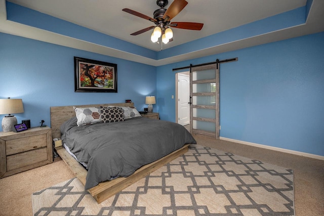 1712 Galena Dr, Port Washington, WI 53074 - carpeted bedroom with a barn door, baseboards, and ceiling fan