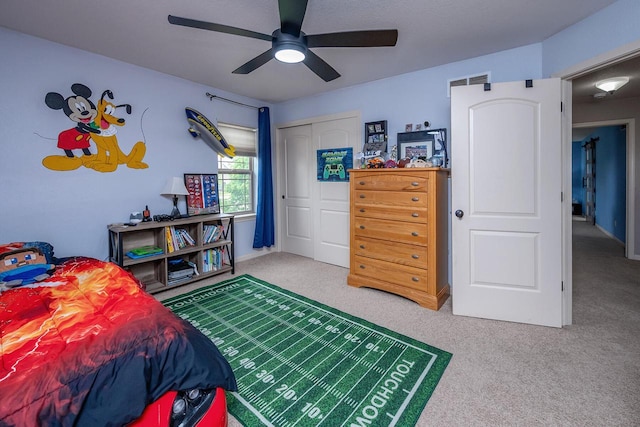 1712 Galena Dr, Port Washington, WI 53074 - carpeted bedroom featuring a ceiling fan and a closet