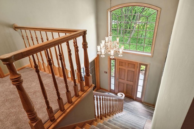 936 Broken Bow Ct, Delafield, WI 53018 - foyer entrance with stairs and a chandelier