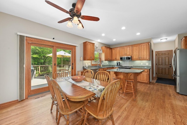 N66W13568 Crestwood Dr, Menomonee Falls, WI 53051 - dining area with light wood-style flooring, ceiling fan, and recessed lighting