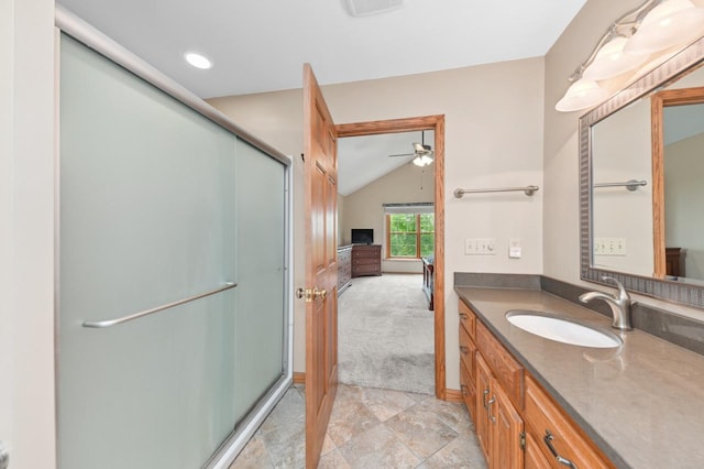N66W13568 Crestwood Dr, Menomonee Falls, WI 53051 - ensuite bathroom with lofted ceiling, a shower stall, vanity, and ceiling fan