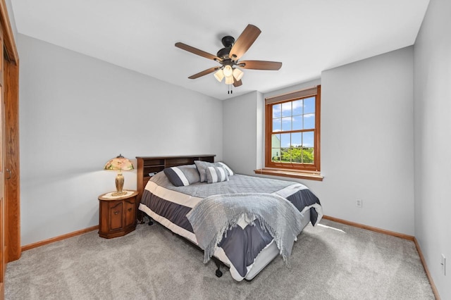 N66W13568 Crestwood Dr, Menomonee Falls, WI 53051 - carpeted bedroom featuring baseboards and a ceiling fan