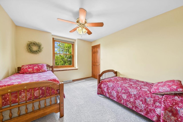 N66W13568 Crestwood Dr, Menomonee Falls, WI 53051 - bedroom featuring carpet, a ceiling fan, and baseboards