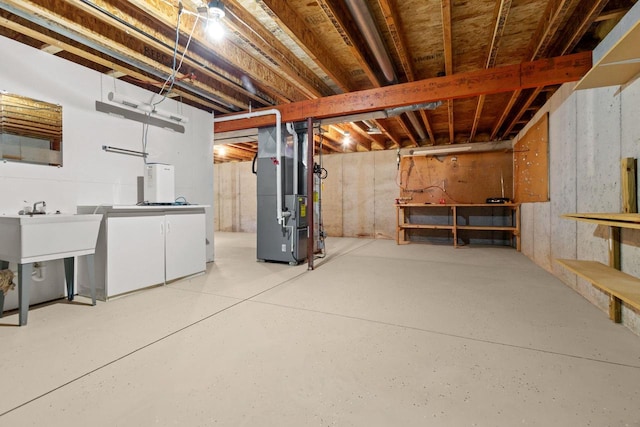 2225 Paul Rd, Manitowoc, WI 54220 - unfinished basement with heating unit and a sink
