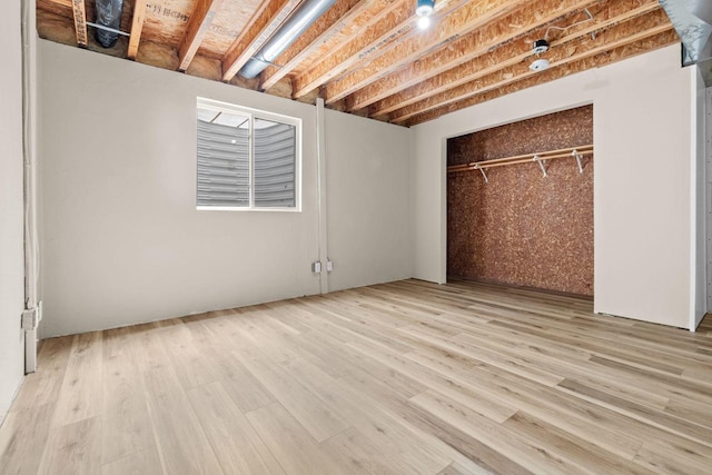 2225 Paul Rd, Manitowoc, WI 54220 - unfurnished bedroom featuring light wood-style flooring and a closet
