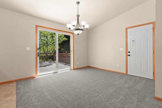2225 Paul Rd, Manitowoc, WI 54220 - spare room featuring a chandelier, baseboards, and carpet