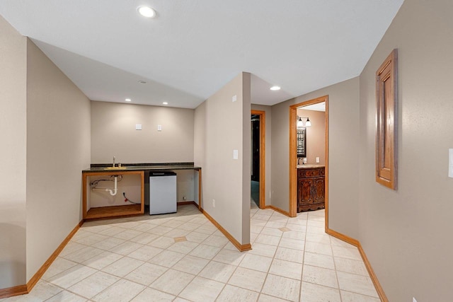 N2281 Lakewood Ln, Chilton, WI 53014 - kitchen with a sink, recessed lighting, baseboards, refrigerator, and light tile patterned flooring