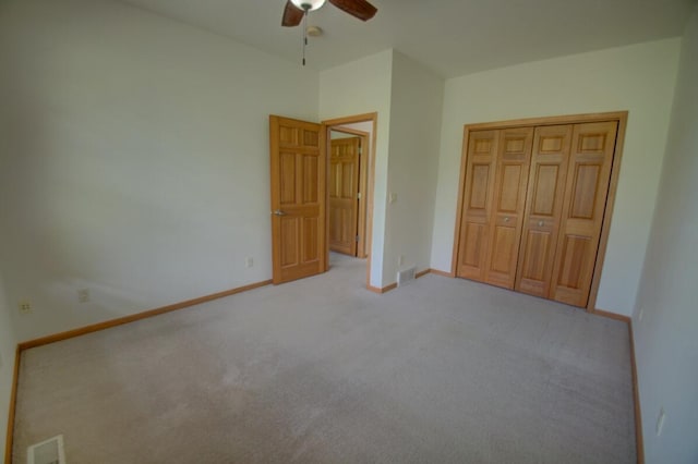 1835 Alpine Pl, Onalaska, WI 54650 - unfurnished bedroom with carpet flooring, baseboards, and ceiling fan