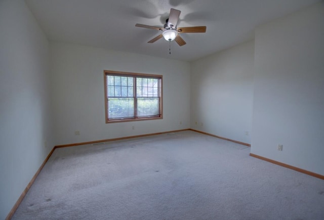 1835 Alpine Pl, Onalaska, WI 54650 - carpeted spare room featuring a ceiling fan and baseboards