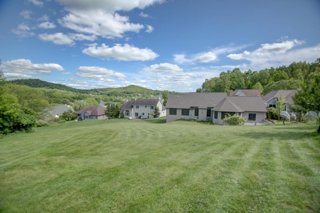 1835 Alpine Pl, Onalaska, WI 54650 - view of front of house with a front lawn and a mountain view