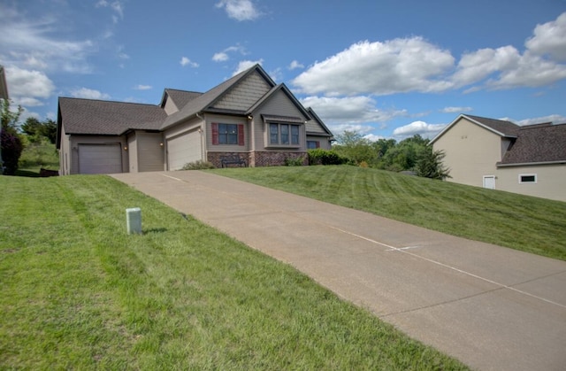 1835 Alpine Pl, Onalaska, WI 54650 - craftsman house with a garage, concrete driveway, and a front lawn