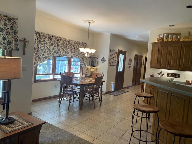 1430 Sherwood Ct, Wisconsin Rapids, WI 54494 - dining area with light tile patterned flooring, a chandelier, baseboards, and recessed lighting