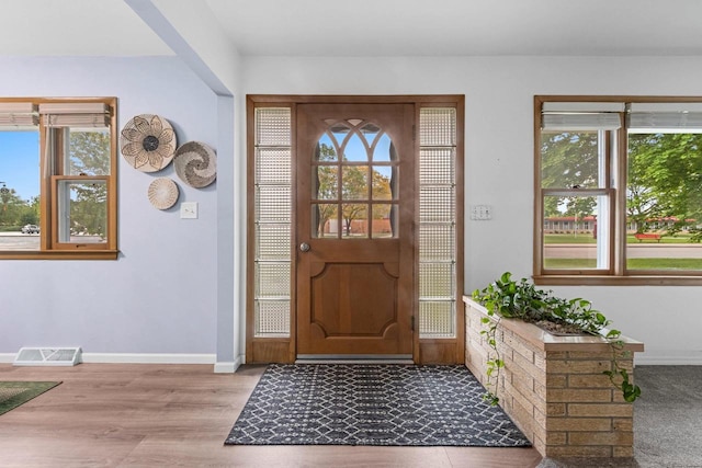 1037 S Union St, Shawano, WI 54166 - foyer featuring baseboards and wood finished floors