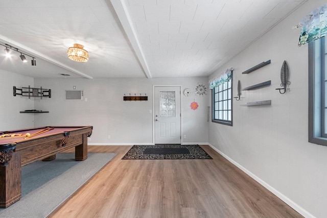 1037 S Union St, Shawano, WI 54166 - foyer with wood finished floors, baseboards, billiards table, and beamed ceiling